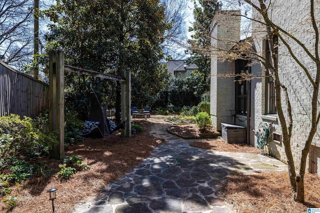 view of yard with a patio area and fence