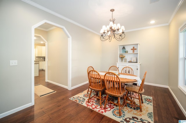 dining space featuring arched walkways, dark wood-style floors, baseboards, and ornamental molding