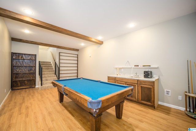 playroom featuring pool table, baseboards, beamed ceiling, light wood-style floors, and a sink