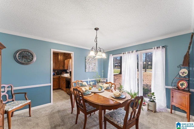 dining room featuring light carpet, a textured ceiling, a chandelier, and ornamental molding