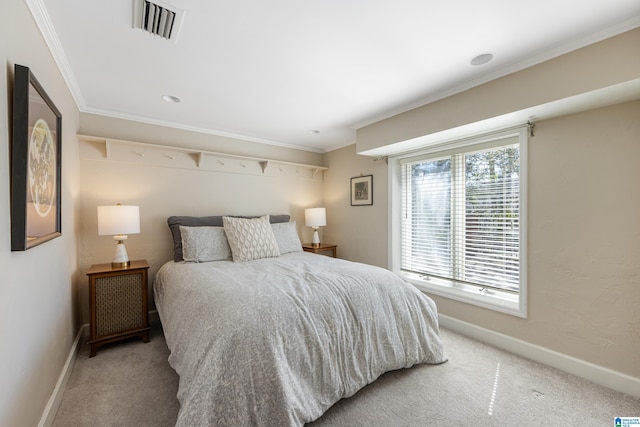 bedroom featuring crown molding, visible vents, and light carpet