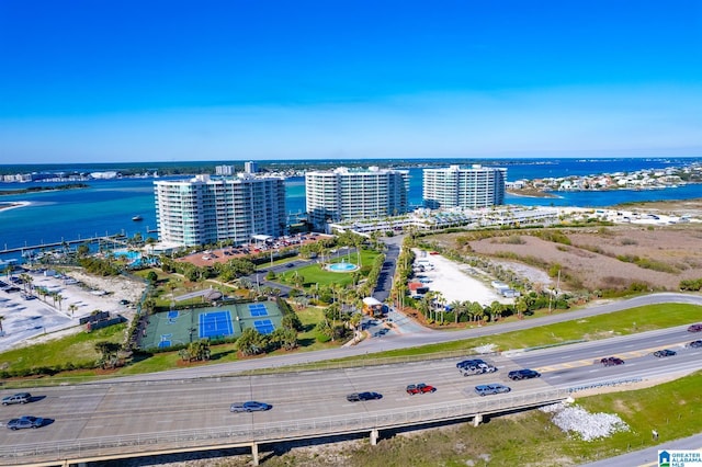 drone / aerial view with a water view and a city view