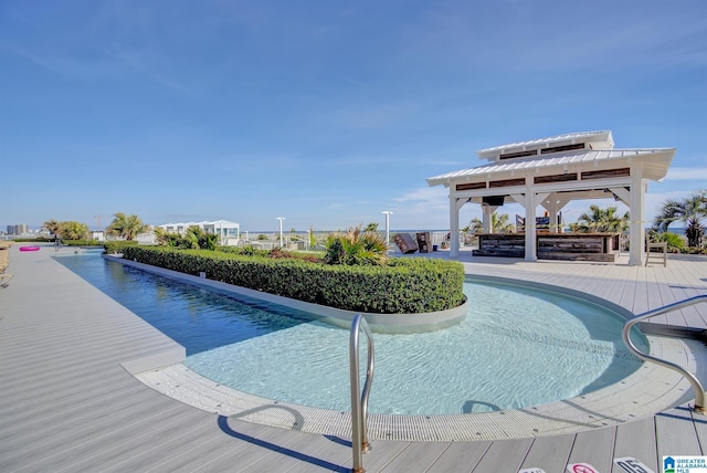 view of swimming pool featuring a gazebo