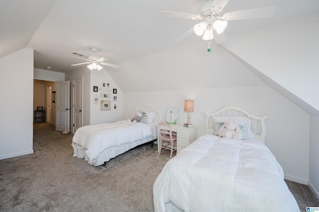 carpeted bedroom with vaulted ceiling, baseboards, visible vents, and ceiling fan