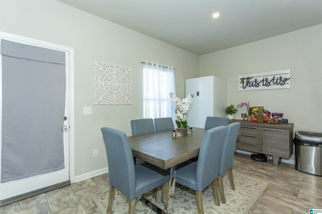 dining room with baseboards