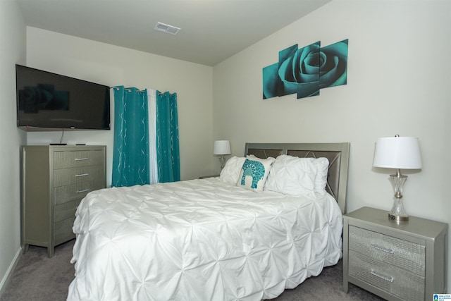 bedroom featuring carpet flooring and visible vents