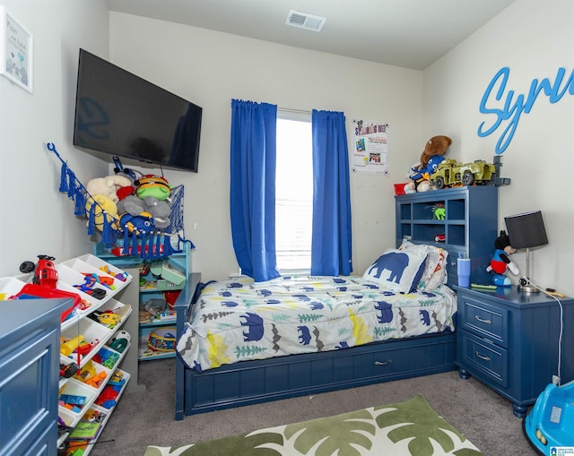 bedroom featuring carpet flooring and visible vents