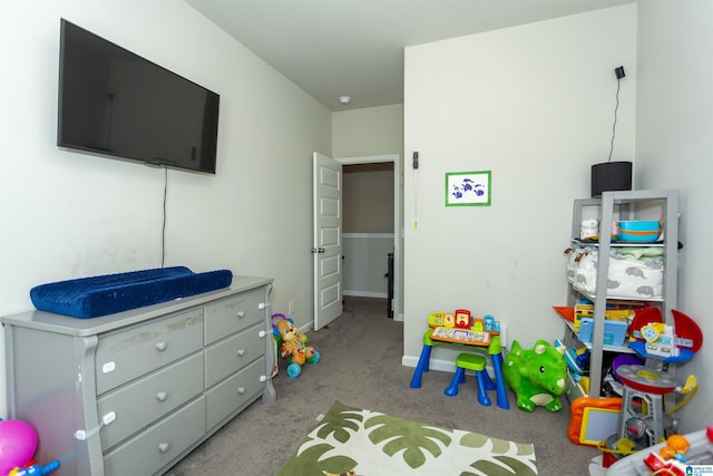 bedroom with carpet flooring and baseboards