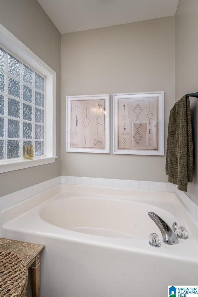 full bathroom with a garden tub