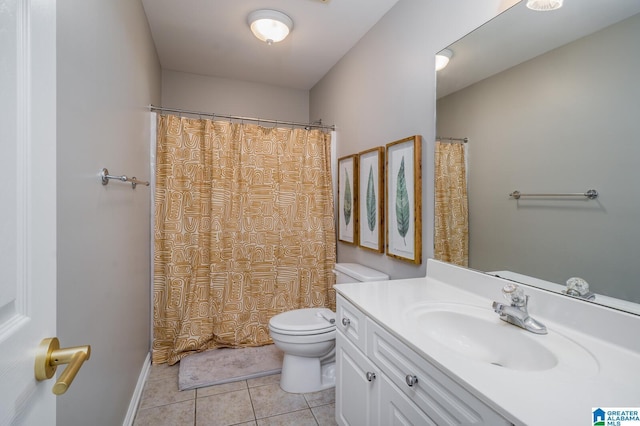 full bath featuring tile patterned floors, a shower with curtain, toilet, baseboards, and vanity