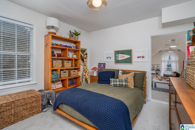 bedroom with light colored carpet