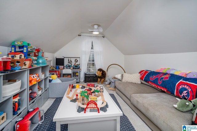 recreation room featuring ceiling fan, lofted ceiling, and carpet floors