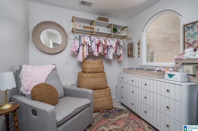 walk in closet with visible vents