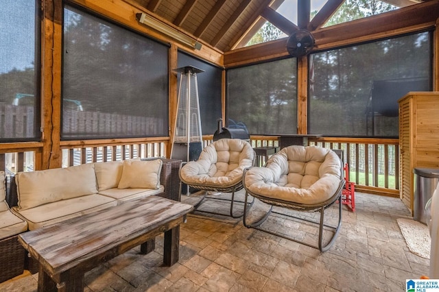 sunroom / solarium with vaulted ceiling with beams and wood ceiling