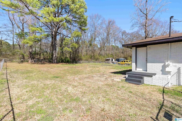 view of yard with fence