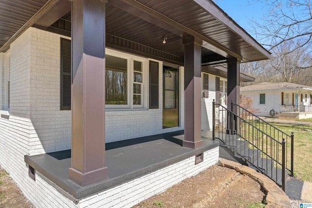 exterior space featuring brick siding