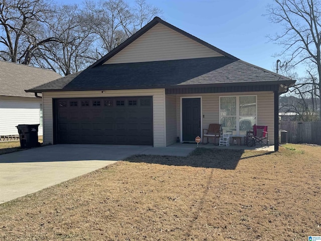 ranch-style home with fence, concrete driveway, an attached garage, a shingled roof, and central AC unit