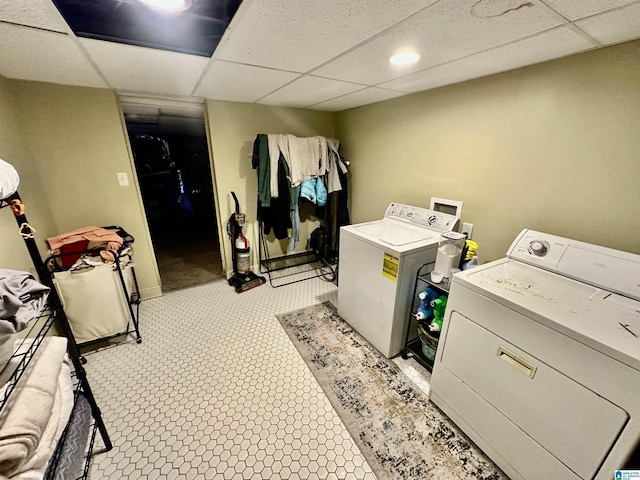 laundry area with separate washer and dryer and laundry area