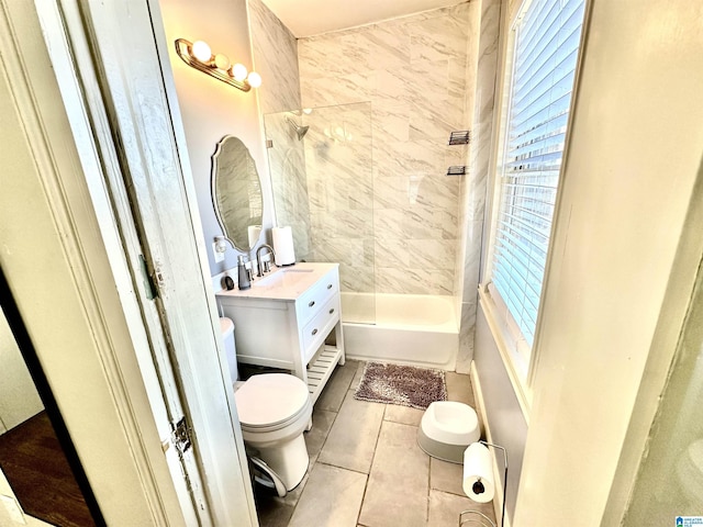 full bathroom featuring vanity, tile patterned floors, toilet, and tub / shower combination