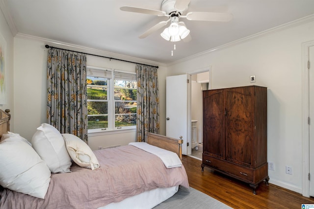 bedroom with ceiling fan, crown molding, baseboards, and wood finished floors