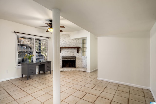 unfurnished living room featuring light tile patterned floors, baseboards, and built in shelves