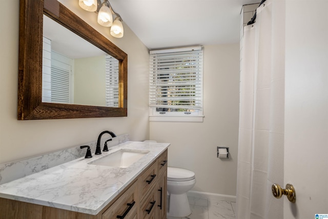 bathroom featuring baseboards, toilet, a shower with curtain, marble finish floor, and vanity