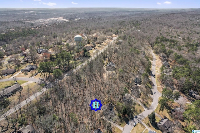 bird's eye view featuring a view of trees