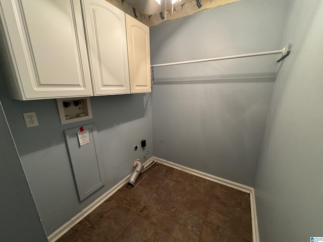 laundry area featuring washer hookup, cabinet space, baseboards, and gas dryer hookup