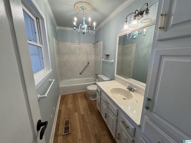 full bathroom with wood finished floors, visible vents, shower / washtub combination, crown molding, and toilet