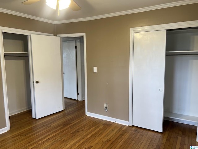 unfurnished bedroom featuring baseboards, ornamental molding, and hardwood / wood-style flooring