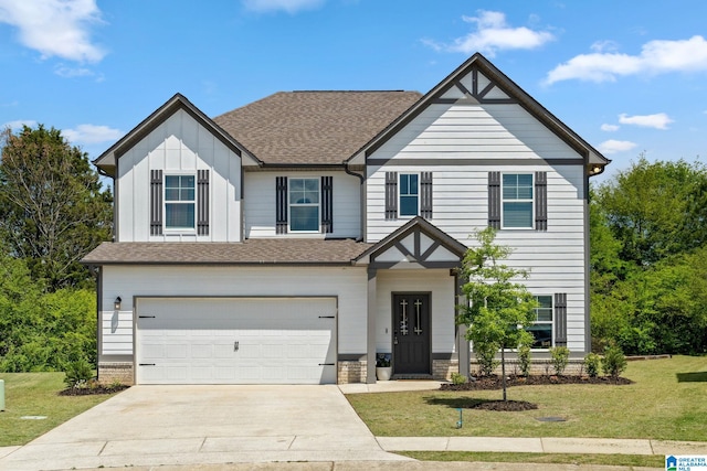 view of front facade with driveway, roof with shingles, board and batten siding, a front yard, and an attached garage