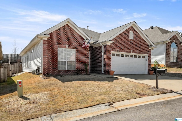 view of front facade with brick siding, an attached garage, concrete driveway, and fence