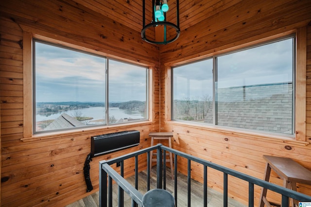 sunroom with a water view