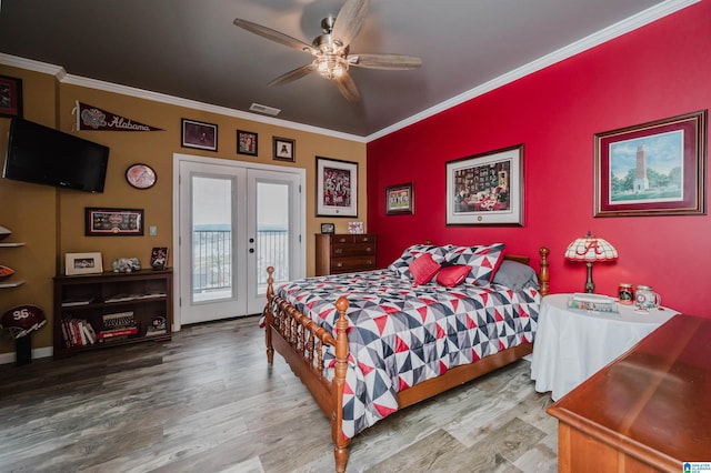 bedroom with french doors, wood finished floors, access to exterior, and crown molding