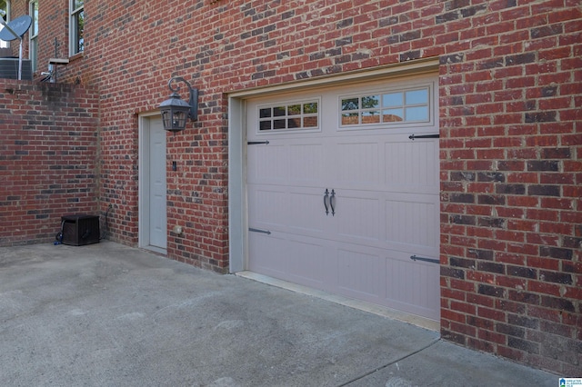 garage featuring driveway