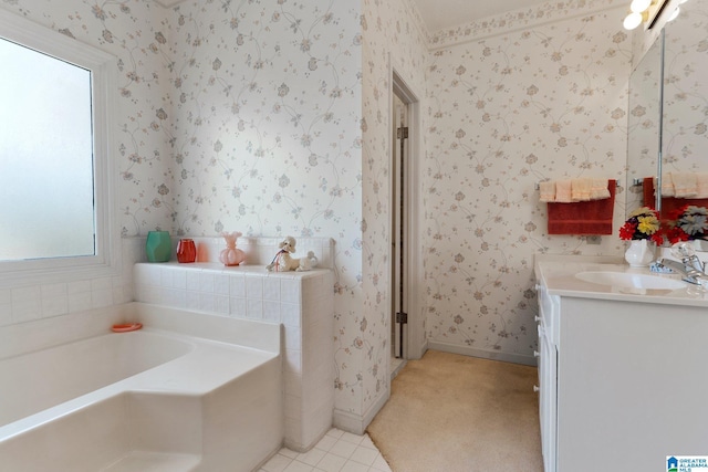 bathroom featuring vanity, baseboards, wallpapered walls, tile patterned floors, and a bath