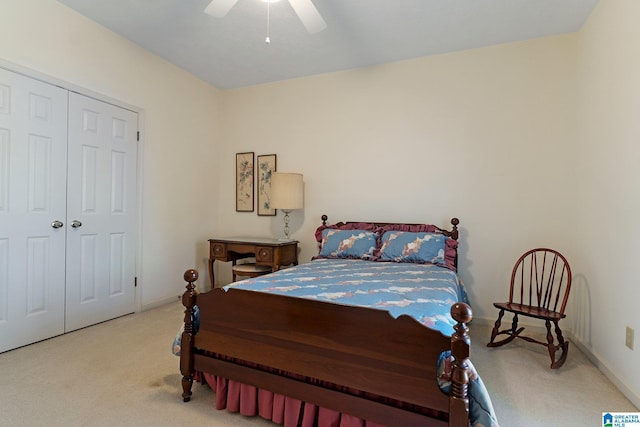 bedroom with a closet, ceiling fan, baseboards, and carpet