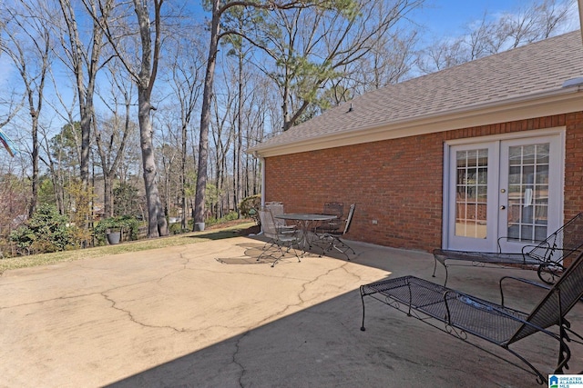 view of patio featuring french doors and outdoor dining space