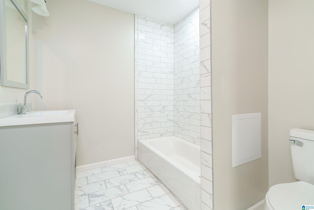 full bath featuring toilet, marble finish floor, tub / shower combination, baseboards, and vanity