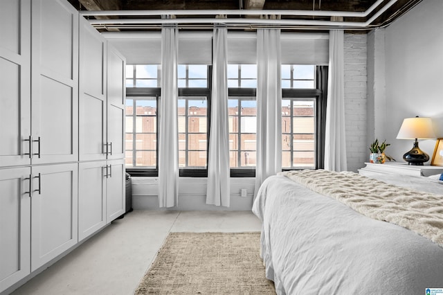 bedroom with multiple windows