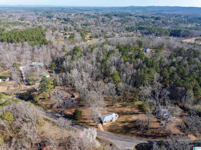 aerial view with a wooded view