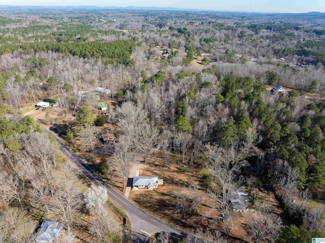 bird's eye view featuring a view of trees