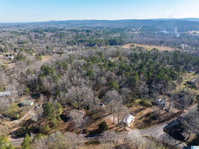 aerial view featuring a view of trees