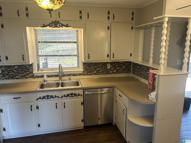 kitchen with tasteful backsplash, a sink, light countertops, and stainless steel dishwasher