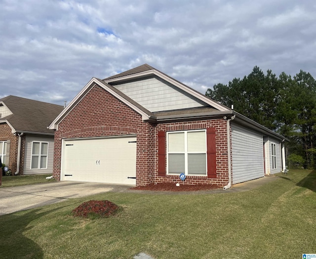 single story home with brick siding, an attached garage, concrete driveway, and a front yard