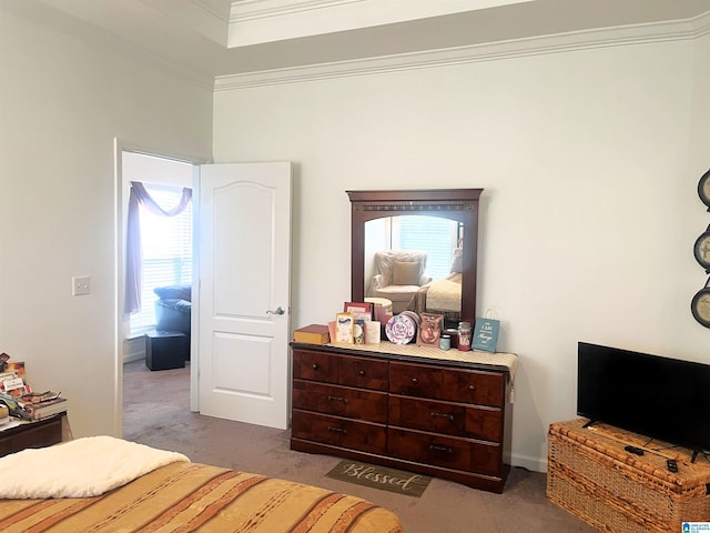 carpeted bedroom featuring ornamental molding