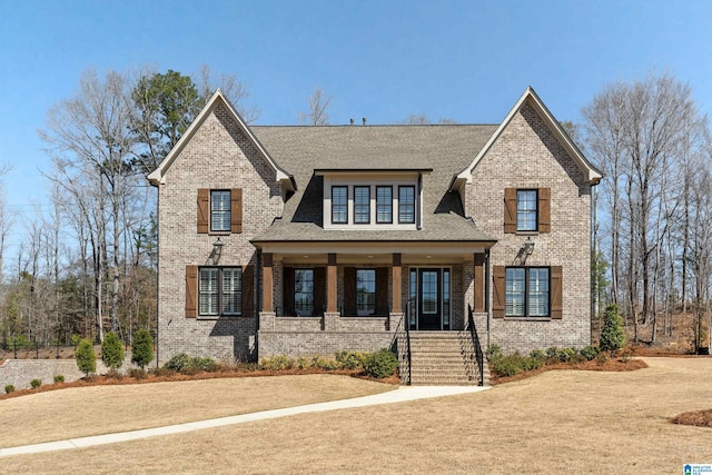 view of front of home with brick siding