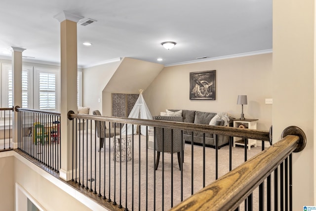 interior space featuring visible vents, recessed lighting, and crown molding