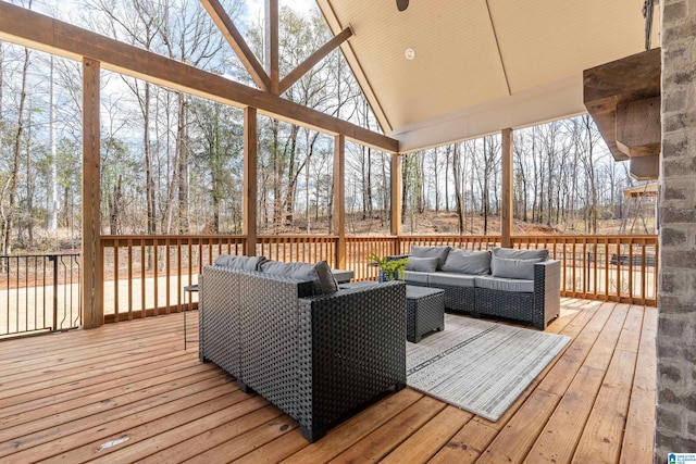 wooden deck with an outdoor hangout area