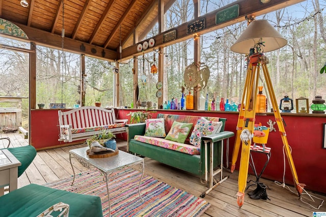 sunroom featuring wooden ceiling and lofted ceiling with beams